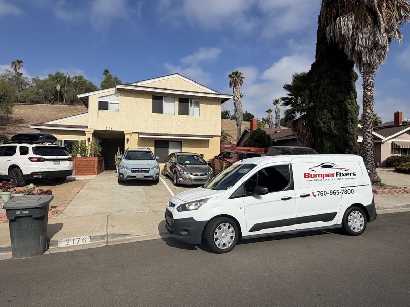Bumper Fixers branded service van parked at a customer's home
